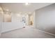 Bright hallway featuring neutral walls and carpet, access to bedrooms, and a view of the upstairs bathroom at 3831 E 141St Ave, Thornton, CO 80602