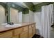 Traditional bathroom with a vanity and shower-tub combination at 6722 S Winnipeg Cir # 102, Aurora, CO 80016