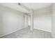 Bedroom featuring neutral walls, carpeted floors, and closet space at 7440 S Blackhawk St # 2-203, Englewood, CO 80112