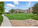 A well maintained lawn and manicured landscaping add to the curb appeal of these comfortable condos at 7440 S Blackhawk St # 2-203, Englewood, CO 80112