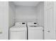 Convenient laundry room with modern washer and dryer units at 7440 S Blackhawk St # 2-203, Englewood, CO 80112