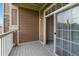 Private balcony area with a sliding glass door to let natural light in at 7440 S Blackhawk St # 2-203, Englewood, CO 80112