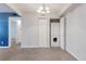 Bright bedroom with closet featuring in-unit washer and dryer at 12053 E Harvard Ave # 107, Aurora, CO 80014