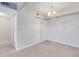 Cozy bedroom with neutral carpeting, closet space and overhead lighting at 12053 E Harvard Ave # 107, Aurora, CO 80014