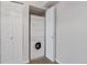 Stacked washer and dryer in closet at 12053 E Harvard Ave # 107, Aurora, CO 80014