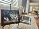 Close up of stainless steel kitchen sink with granite counter and picture of garden at 12627 Fisher Dr, Englewood, CO 80112