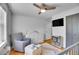 Bright Bedroom with ceiling fan, hardwood floors, and plenty of closet space at 12821 W 60Th Ave, Arvada, CO 80004