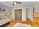 Bedroom features hardwood floors and closet at 12821 W 60Th Ave, Arvada, CO 80004