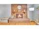 Charming fireplace featuring rustic brick and warm lighting at 12821 W 60Th Ave, Arvada, CO 80004
