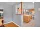 Kitchen view through an open concept dining room at 12821 W 60Th Ave, Arvada, CO 80004
