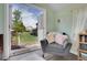 Relaxing view from inside the shed overlooking the home's backyard and lush greenery at 12821 W 60Th Ave, Arvada, CO 80004
