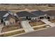 An aerial view showcases the home's placement in a tranquil neighborhood at 26741 E Peakview Pl, Aurora, CO 80016