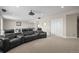 Basement featuring plush carpet, home theater seating, and adjacent rooms for additional living space at 26741 E Peakview Pl, Aurora, CO 80016