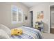 Well-lit bedroom with carpet and ample space for a play area at 26741 E Peakview Pl, Aurora, CO 80016