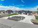 Attractive home featuring stone accents, meticulous landscaping, and circular driveway at 29585 E 165Th Ave, Brighton, CO 80603