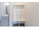 Hallway with a bench, coat hooks, and convenient access to the washroom at 29585 E 165Th Ave, Brighton, CO 80603