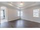 Spacious main bedroom features hardwood floors, tray ceiling and ensuite bathroom at 29585 E 165Th Ave, Brighton, CO 80603