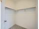 Walk-in closet featuring an organized shelving system at 700 N Bently St, Watkins, CO 80137