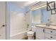 Clean bathroom with a bathtub, toilet and vanity at 19644 E Girard Dr, Aurora, CO 80013