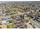 Scenic aerial view of a neighborhood featuring tree-lined streets and various single-Gathering homes at 4625 S Huron St, Englewood, CO 80110