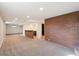 Large basement with brick bar and fireplace, offering ample space for recreation at 4625 S Huron St, Englewood, CO 80110