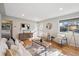 Cozy living room with hardwood floors, neutral tones, and a comfortable seating arrangement at 4625 S Huron St, Englewood, CO 80110