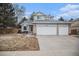 Charming two-story home boasting a three-car garage and well-manicured front yard at 16522 Bluebonnet Dr, Parker, CO 80134