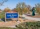 View of a park sign in a neighborhood setting, complete with playground and recreational areas at 12242 W 56Th Pl, Arvada, CO 80002