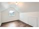 Cozy room with natural light from the window and hardwood floors at 7957 Elm St, Louviers, CO 80131