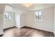Bedroom with vaulted ceilings and window that brings in natural light at 7957 Elm St, Louviers, CO 80131