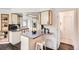 Bright kitchen featuring classic cabinetry and ample counter space for cooking and entertaining at 7957 Elm St, Louviers, CO 80131