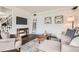 Inviting living room with neutral decor, stylish furnishings, and a cozy ambiance at 7957 Elm St, Louviers, CO 80131