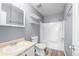 Bathroom with new floors, shelves, and shower at 2285 Coronado Pkwy # D, Denver, CO 80229
