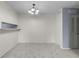 Dining room with new carpet and modern lighting fixture at 2285 Coronado Pkwy # D, Denver, CO 80229