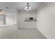 Bright living room featuring new carpet and neutral paint at 2285 Coronado Pkwy # D, Denver, CO 80229