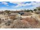 An aerial view shows a storage barn and garden plots at 7615 Lemon Gulch Way, Castle Rock, CO 80108