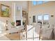 Elegant living room with fireplace and ample natural light at 7615 Lemon Gulch Way, Castle Rock, CO 80108