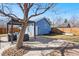 Backyard featuring a pergola with patio furniture and a blue shed at 4846 Knox Ct, Denver, CO 80221