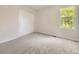 Bright bedroom with carpet flooring, closet, and a window offering great natural light at 13244 Kearney St, Thornton, CO 80602