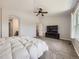 Relaxing main bedroom with a ceiling fan, ample space, and an ensuite bathroom at 13244 Kearney St, Thornton, CO 80602