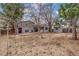 Large backyard with detached shed, patio, deck and mature trees at 2145 S Lewiston St, Aurora, CO 80013