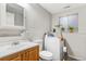 Functional laundry room with sink, toilet and modern washer and dryer at 2145 S Lewiston St, Aurora, CO 80013