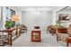 Inviting living room with neutral tones, plush carpet, and ample space for seating arrangements at 2145 S Lewiston St, Aurora, CO 80013
