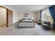 Bright main bedroom featuring a plush bed, and a large window at 4121 S Andes Way, Aurora, CO 80013