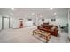 Spacious finished basement offers room for recreation, with a cozy seating area and convenient wet bar at 5753 S Kittredge St, Centennial, CO 80015