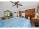 Bedroom with traditional design, complemented by a ceiling fan and closet at 5753 S Kittredge St, Centennial, CO 80015