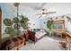 Whimsical bedroom with wall art, a daybed, a ceiling fan, and a window at 5753 S Kittredge St, Centennial, CO 80015