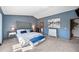 Main bedroom with vaulted ceilings, soft carpet, decoratively appointed furnishings, and ensuite entrance at 5753 S Kittredge St, Centennial, CO 80015
