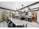 Open kitchen with a spacious breakfast bar, stainless steel appliances, and plenty of natural light at 5753 S Kittredge St, Centennial, CO 80015