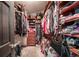 Walk-in closet with custom shelving and plenty of space for storage at 5753 S Kittredge St, Centennial, CO 80015